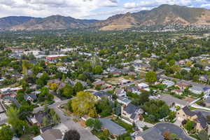 View of property location with a mountainous background and nearby suburban area