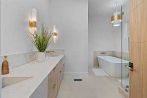 Bathroom with a freestanding tub and double vanity