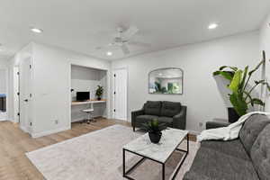 Living area featuring an office area, light wood-style floors, recessed lighting, and ceiling fan