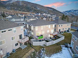 Aerial view at dusk of a mountain view and a residential view