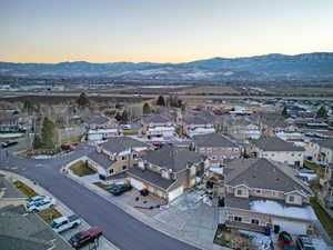 Aerial view at dusk of a mountain view and a residential view