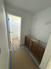 Full bathroom featuring a tub