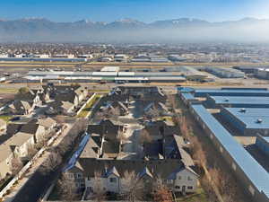 Aerial view of residential area featuring mountains