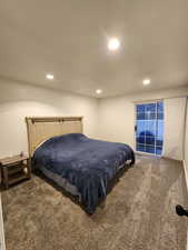 Carpeted bedroom with access to exterior and recessed lighting