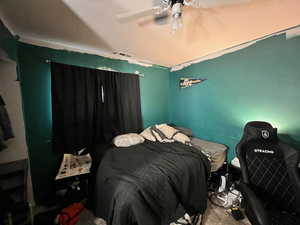 Bedroom with a ceiling fan