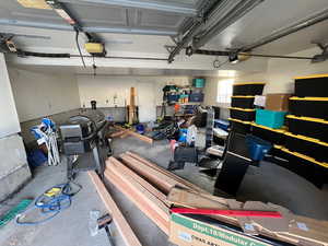 Garage featuring a garage door opener