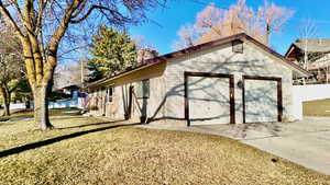 Exterior space with concrete driveway