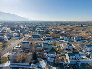 Aerial view of residential area featuring mountains