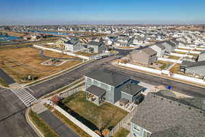 View of property location featuring nearby suburban area and a large body of water