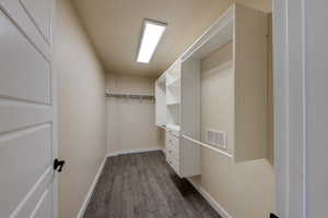 Spacious Primary closet with LVP floors