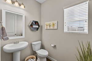 Half bathroom featuring toilet