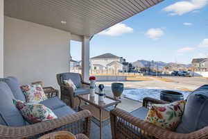 View of patio / terrace with a residential view and an outdoor hangout area