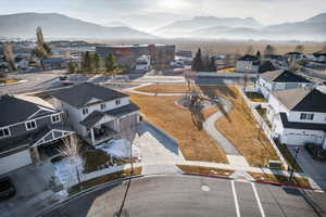 Aerial view of residential area with a mountain backdrop