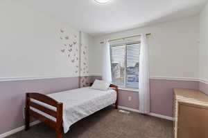 Bedroom featuring carpet