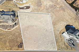 Aerial overview of property's location featuring property boundaries highlighted