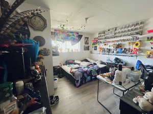 Bedroom with light wood-type flooring