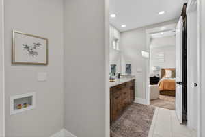 Primary Ensuite featuring washer/dryer hookups