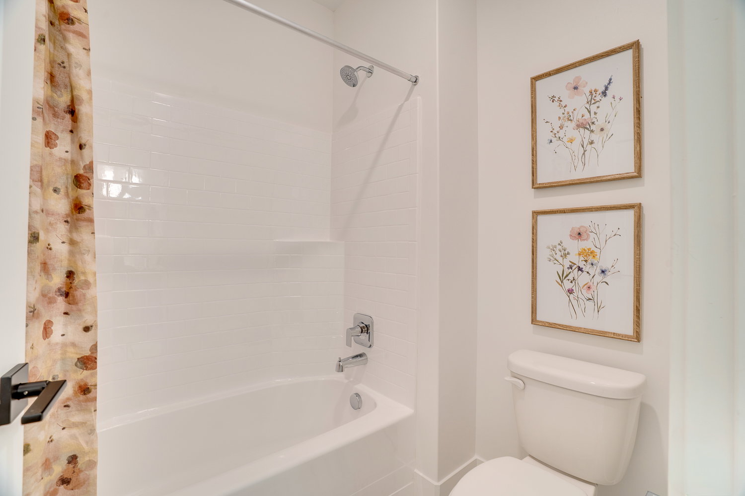 Full bath featuring shower / bath combo and toilet
