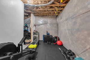 Workout area featuring rubber floors