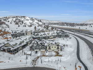 Snowy aerial view with a mountain view