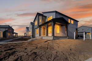 View of front of home featuring a porch and a residential view
