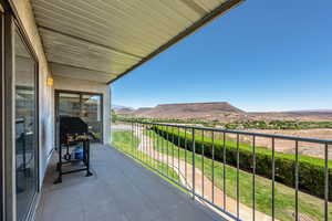 Balcony featuring a grill and a mountain view