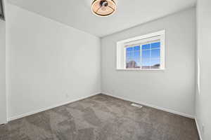 Newly carpeted and painted bedroom