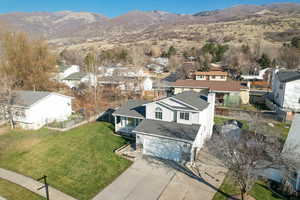 Aerial view of residential area with mountains