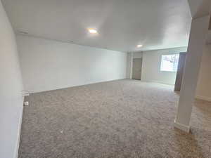 Spare room with carpet flooring and recessed lighting