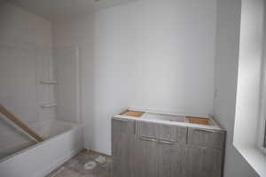 Full bath with tub / shower combination and vanity