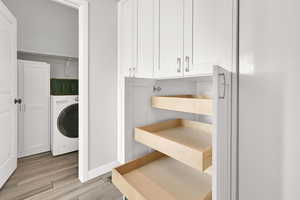 Custom cabinetry at garage entry/mudroom area