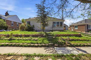 Bungalow-style house featuring brick siding