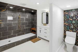 Full bath featuring vanity, recessed lighting, and walk in shower