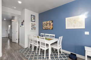 Dining room featuring dark wood finished floors