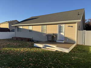 Back of property with deck