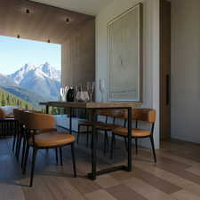 Dining room featuring a mountain view and wood finished floors