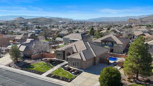 Aerial view of residential area with a mountain backdrop