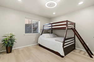 Bedroom featuring light wood-style floors and recessed lighting