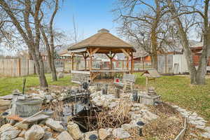 View of patio featuring a gazebo