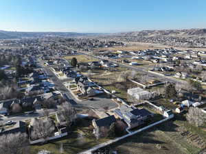 View of property location with nearby suburban area