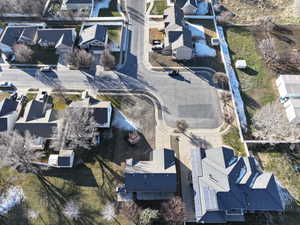 Aerial overview of property's location featuring nearby suburban area