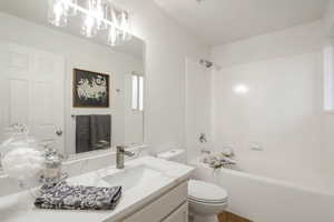 Bathroom featuring vanity and bathtub / shower combination