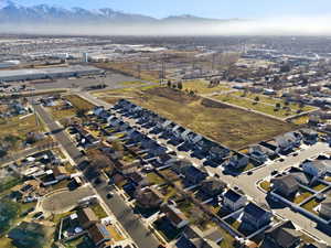 View of property location with a mountainous background and nearby suburban area