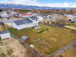 Aerial view of residential area featuring a mountain backdrop