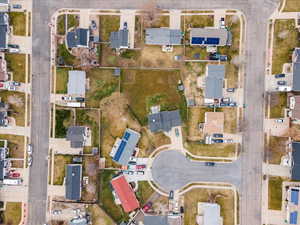 Aerial overview of property's location with nearby suburban area