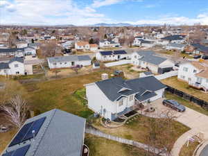 Aerial view of residential area with a mountainous background