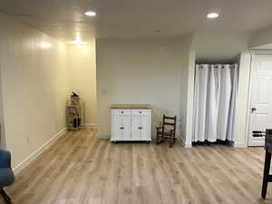 Unfurnished room with light wood-style floors and recessed lighting