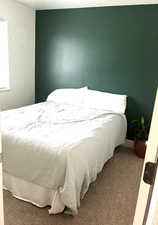 Bedroom featuring carpet floors