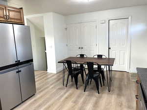 Dining area featuring light wood-type flooring