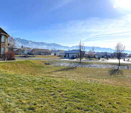 View of home's community featuring a mountain view and a residential view